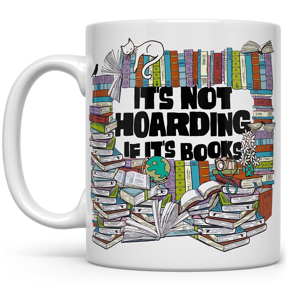 white mug that says It's Not Hoarding if it's Books with lots of books surrounding the words