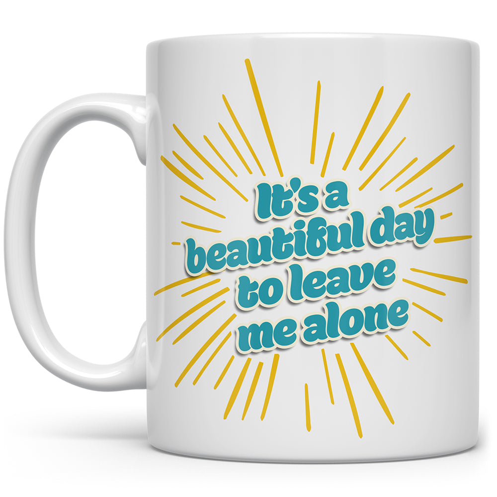 Mug that says It's a beautiful day to leave my alone with yellow bursts