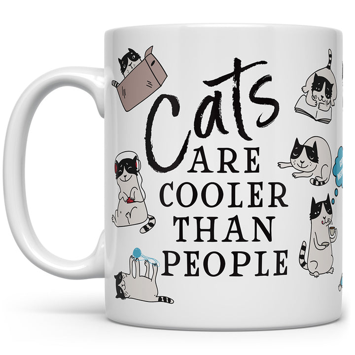 Mug that says Cats Are Cooler Than People with pictures of cats