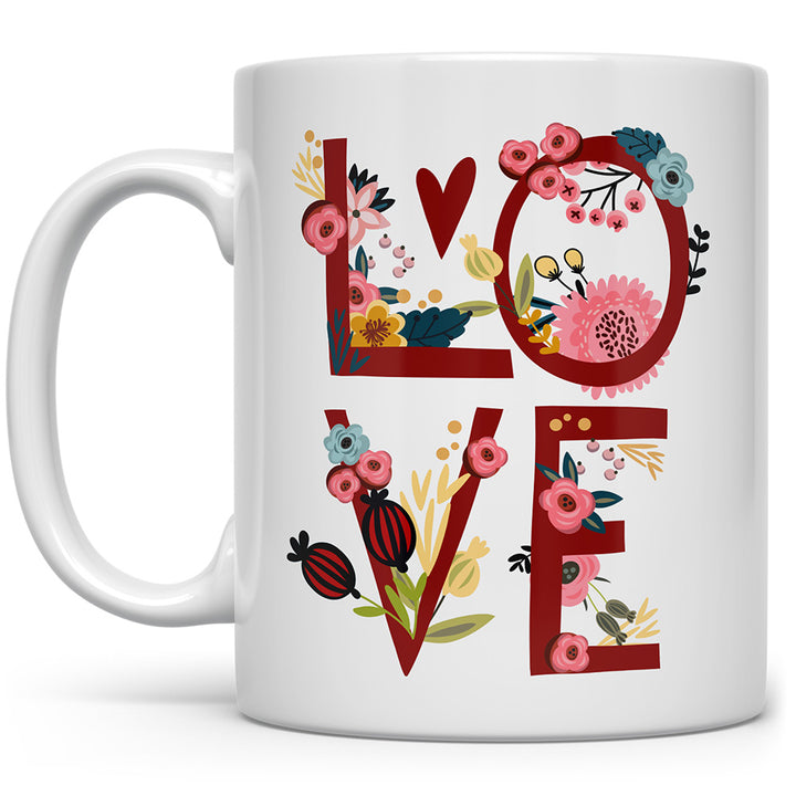 Mug that says Love with flowers around the letters