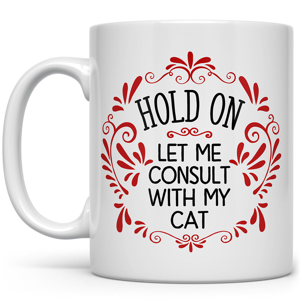 Mug that says Hold On Let me Consult with my Cat with red doodles