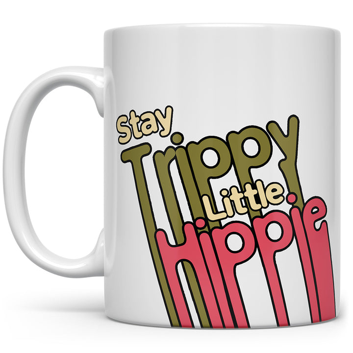 White mug that says Stay Trippy, little Hippie