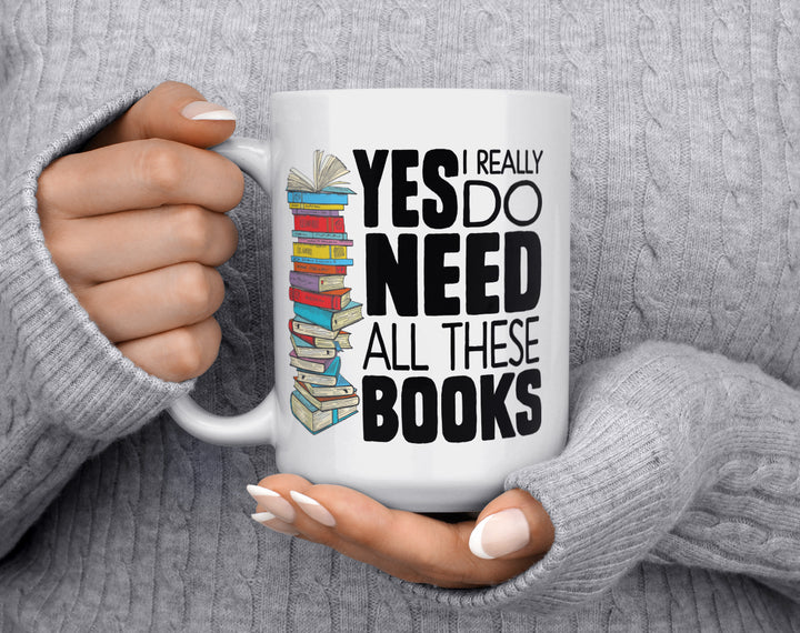 Yes Books Mug held by hands