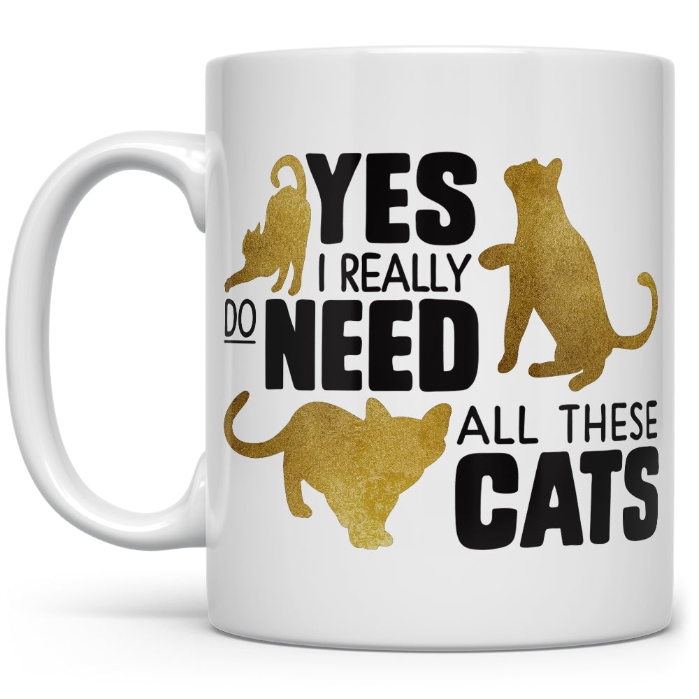 White mug that says Yes, I really do need all these cats with pictures of cats