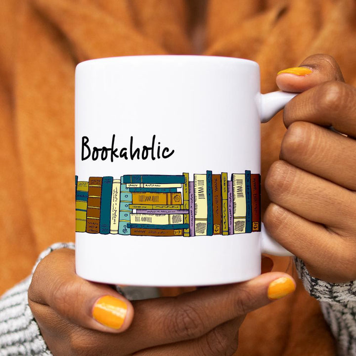 Bookaholic Mug held by hands