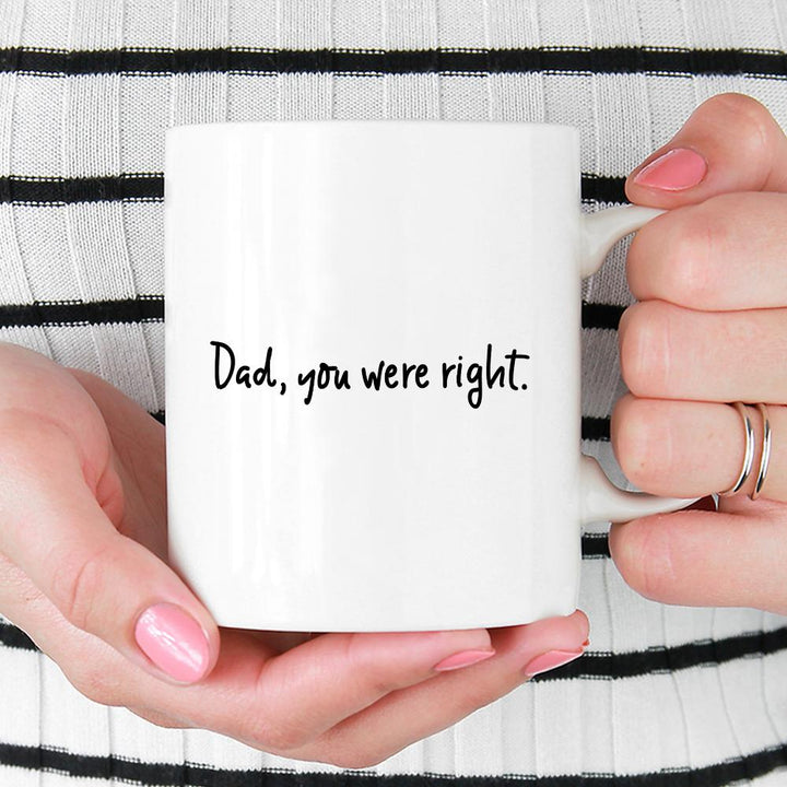 Dad, You Were Right Mug being held by person wearing black and white striped top