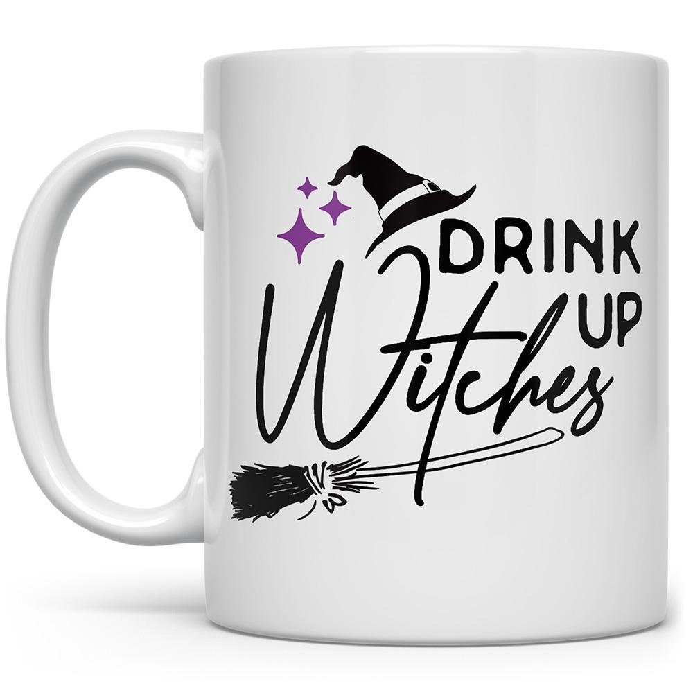 white mug that says Drink Up Witches with broomstick, witches hat, and three purple stars on white background