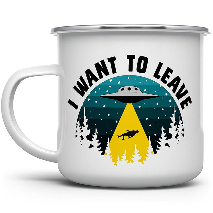 a white camp mug that says I want to leave with UFO pulling a person up to it