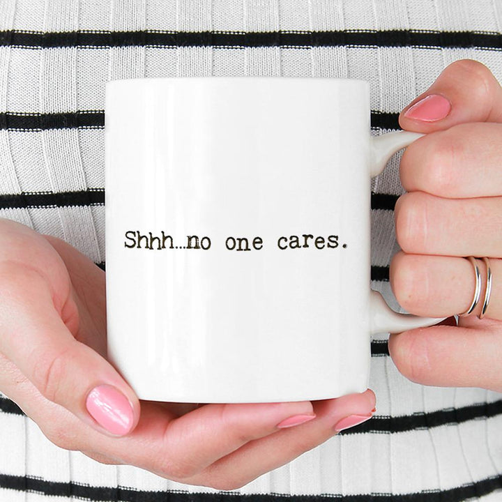 Shhh...no one cares Mug held by hands - Loftipop
